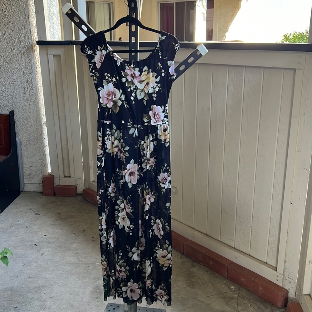 Floral romper with sheer skirt size L